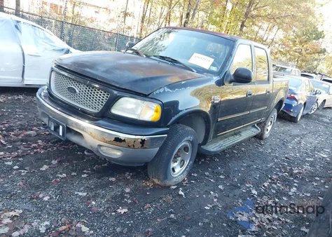 2003 Ford F-150 Lariat/Xlt z USA, uszkodzony, nr VIN 1FTRW08663KB94976